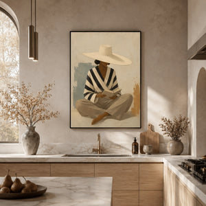 Seated Serenity: Reading Woman with Wide-Brim Hat in a modern kitchen with wood cabinets
