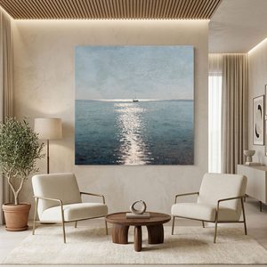 Minimalist Hand-Painted Shimmering Blue Ocean Sailboat Painting in living room seating area